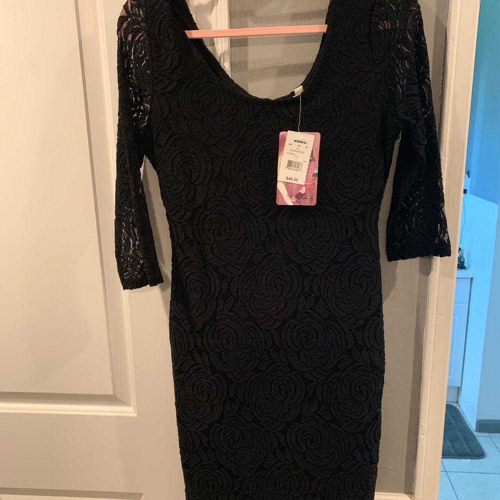 Black form fitting lace dress